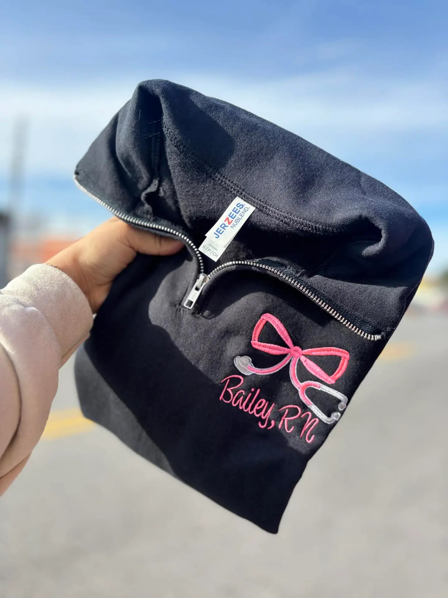 Pink Bow Stethoscope Embroidered Quarter-Zip – Black