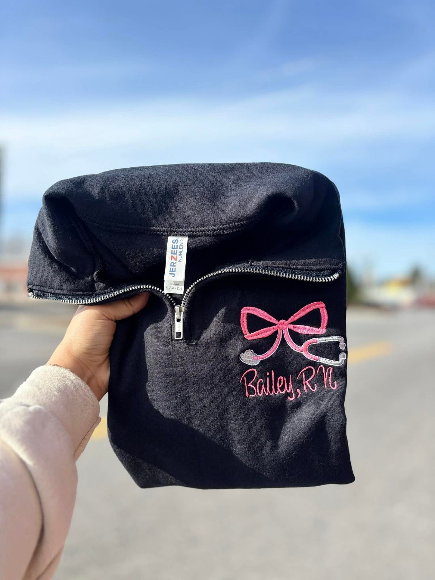 Pink Bow Stethoscope Quarter Zip - Black